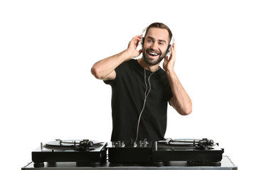 Male DJ playing music on white background