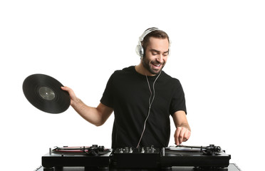 Male DJ playing music on white background