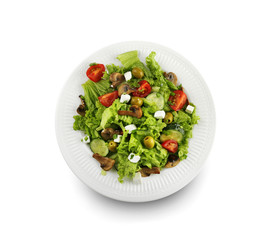 Plate with tasty fresh salad on white background