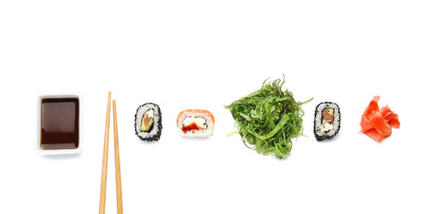 Composition with tasty sushi rolls on white background