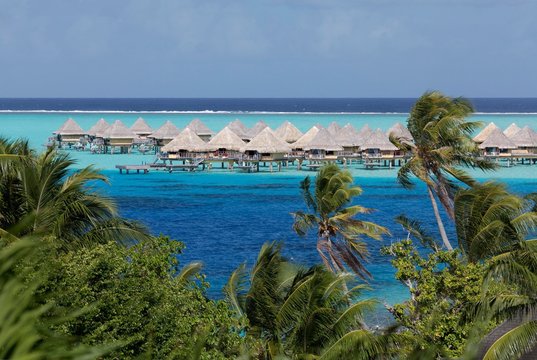 Bungalows in the turquoise sea, Sofitel Bora Bora resort, Bora Bora island, Society islands, French Polynesia, Oceania