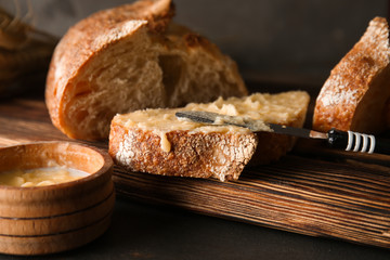 Cut bread with spreading on table