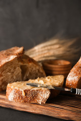 Cut bread with spreading on table
