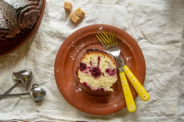 a slice of cherry muffin on a plate
