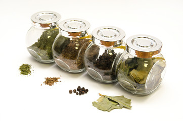 Spice jars on white background