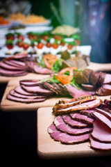 ham on a wooden board, catering offer