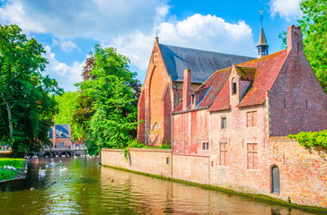 Beautiful canal and traditional houses in the old town of Bruges (Brugge), Belgium