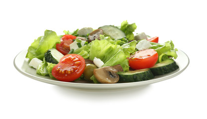 Plate with fresh salad on white background