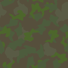 Fototapeta premium Forest camouflage of various shades of green and brown colors