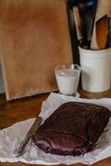 Homemade chocolate brownie with glass of milk