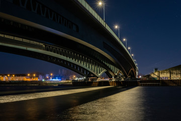 Fototapeta na wymiar Big Bridge at Night, Bridge Construction, bottom of a bridge