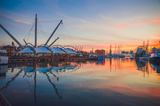 Panoramic view of old port of Genoa at sunset, Liguria, Italy
