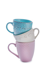 Colorful empty cups on white background