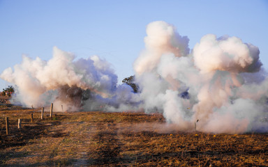Explosions, fire and smoke, war