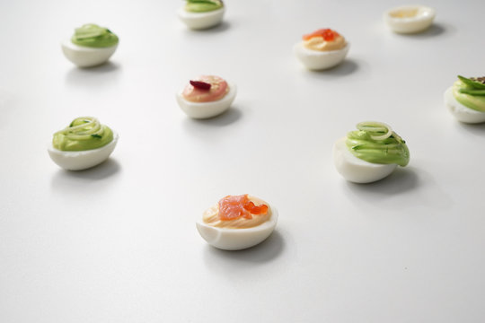 Tasty Deviled Eggs On White Background