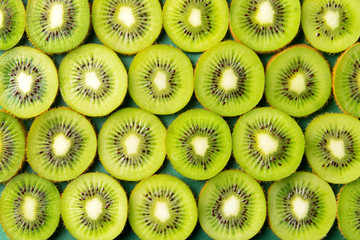 Tasty sliced kiwi as background