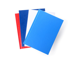 Stack of books on white background