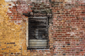 Fototapeta na wymiar texture brick wall with window