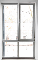 Modern metal-plastic window in flat