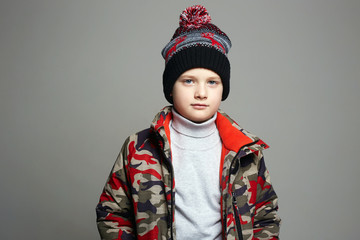 winter outerwear. stylish teenager in hat