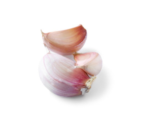 Garlic cloves on white background