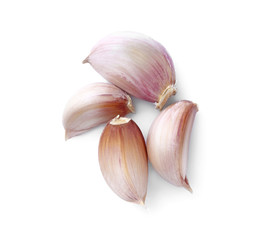 Garlic cloves on white background