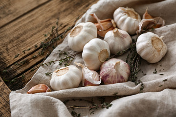 Fresh garlic on wooden background