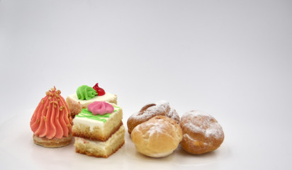 Isolated pastry with cream and sugar dust