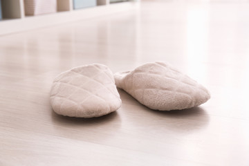 Soft slippers on floor at home