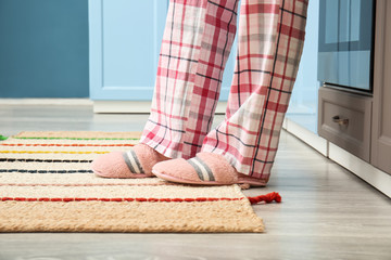 Woman in soft slippers at home