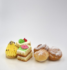 Isolated pastry with cream and sugar dust