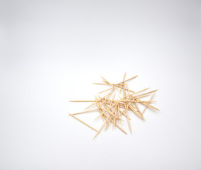 Chaotic toothpicks on the white background