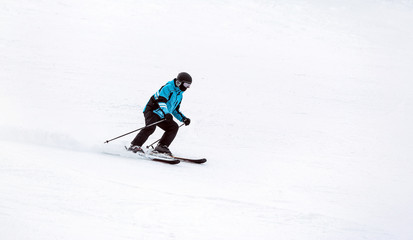 Fototapeta na wymiar Sporty skier at winter resort