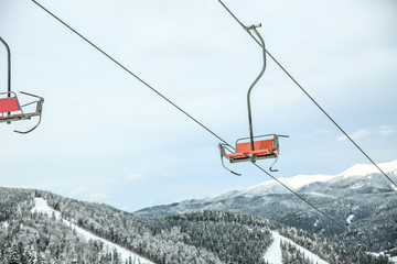 Fototapeta na wymiar Ski lift at mountain resort