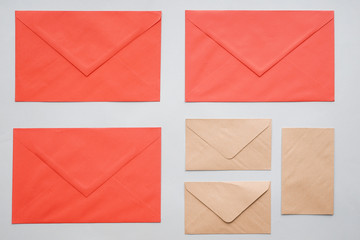 Many blank envelopes on light background