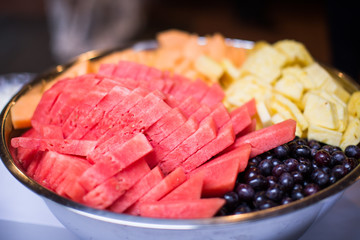 Watermelon fruit platter grapes pineapple closeup
