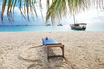 Ocean view on paradise Zanzibar island out of palm leaves