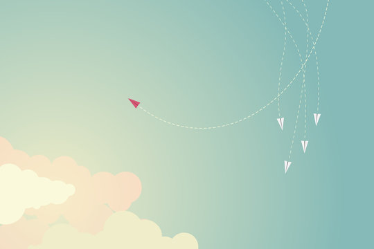 Minimalist style red airplane changing direction and ones. New idea, change, trend, courage, creative solution,business, innovation and unique way concept