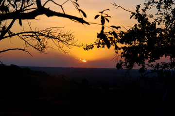 Fototapeta premium A view of the sunset over the Marafa canyon in Kenya, Africa. Landscape and safari under evening sky.