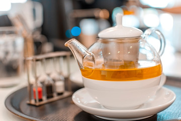 Aromatic hot cup tea on wooden table