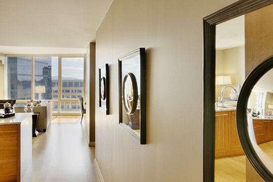 Framed Mirrors on Wall of Upscale Home Interior