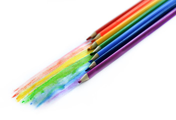 Colored watercolor pencils paint a rainbow. Creation