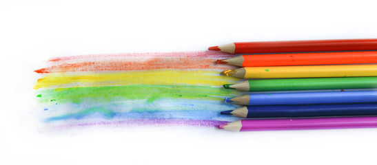 Colored watercolor pencils paint a rainbow. Creation