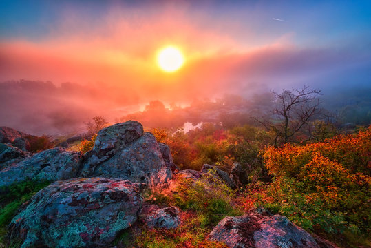 Amazing nature landscape, misty autumn sunrise over the scenic rocky canyon, National park Bugski Guard, Southern Bug river, Mykolaiv region, Ukraine