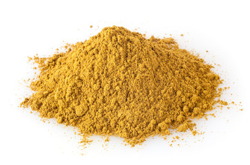 Heap of curry powder isolated on white background