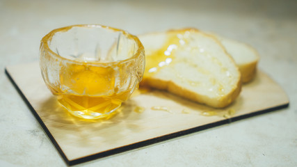 Honey and pieces of bread