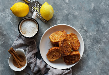 Traditional homemade Spanish torrijas grey stone background. Top view copyspace. Easter dessert 