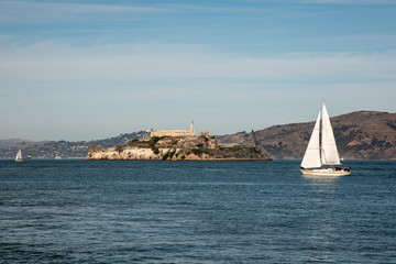 sailboat sailing in the bay of san francisco with alcatraz island in the background