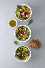 Baked beet and carrot salad with cheese