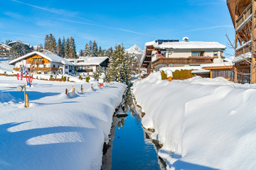Winter landscape with snow covered houses in Seefeld in the Austrian state of Tyrol. Winter in...